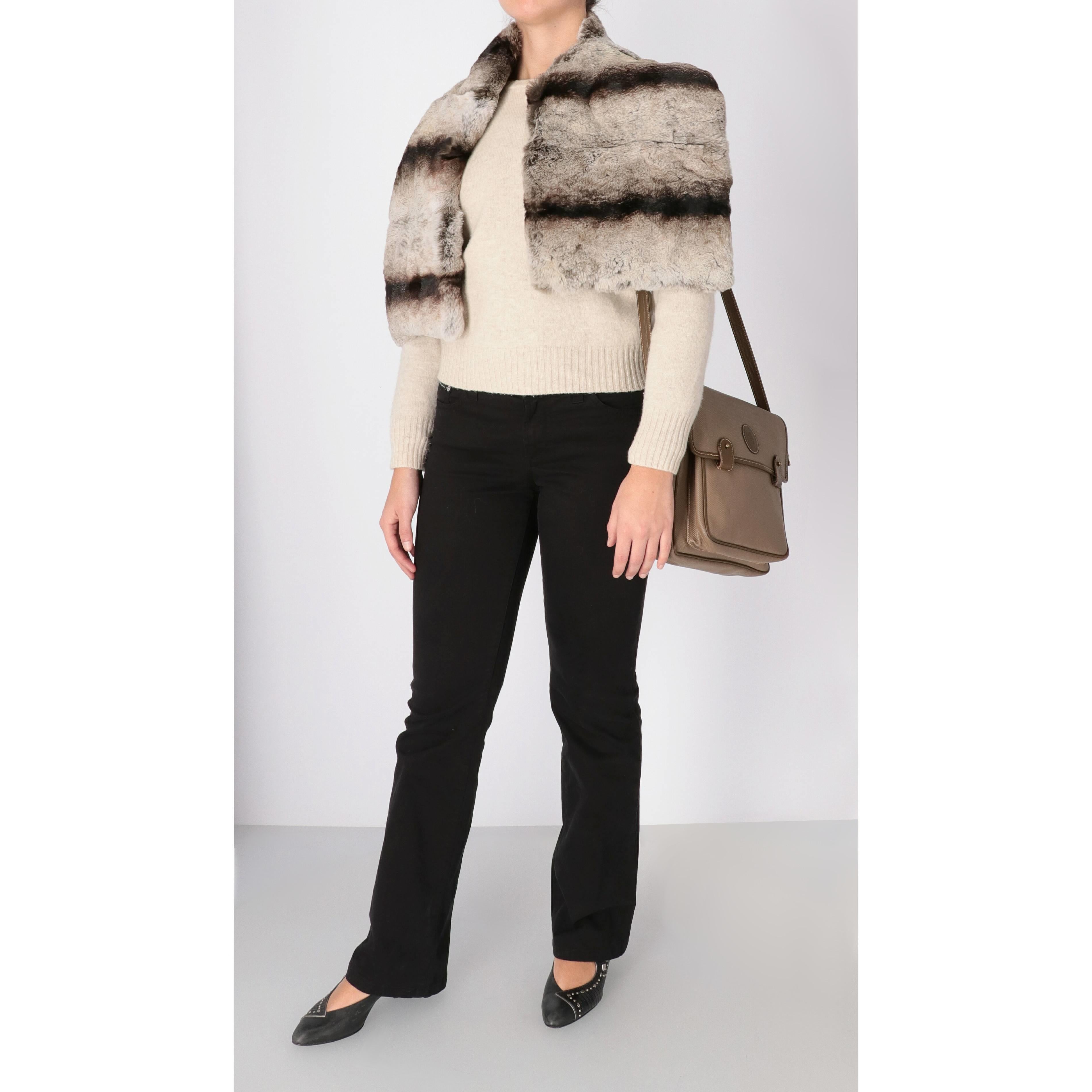Gianfranco Ferré collar with asymmetrical design in chinchilla fur in shades of black and gray. Lined in printed fabric. 

This is a sample without the brand label.

Please note this item cannot be shipped outside the European Union.

Years: