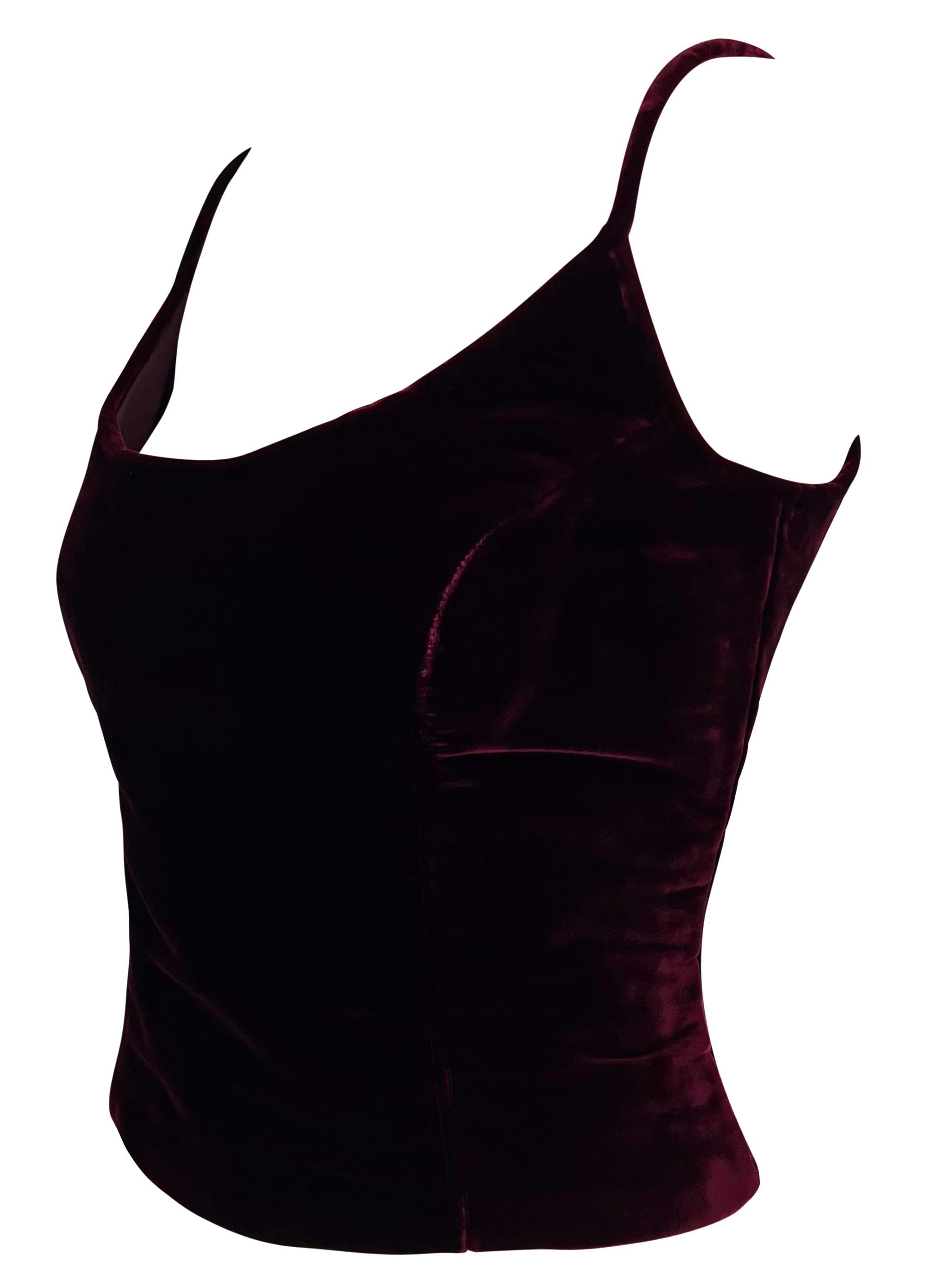 This chic burgundy velvet tank top by Gianfranco Ferré from the 2000s features a wide scoop neckline and a semi-exposed back.

Approximate measurements:
Size - 44FR
Bust: 36