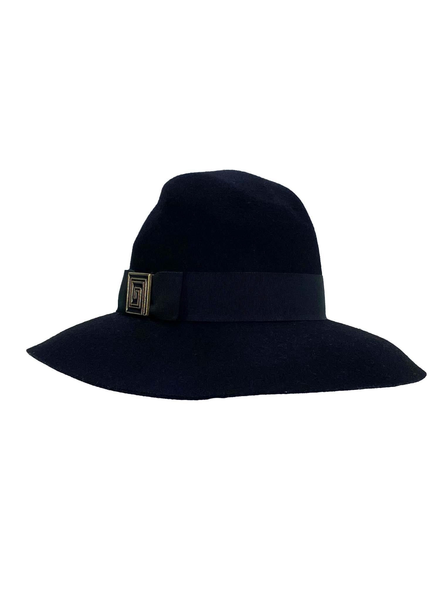 Presenting a versatile floppy Gianni Versace hat, designed by Donatella Versace. From the early 2000s, this hat can be worn down as a floppy hat or with the brim turned up for a more structured look. The ribbon around the base of the hat is