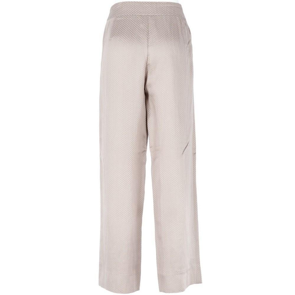 Giorgio Armani grey wide leg grey silk trousers. Tone-on-tone pois and side zip closure.

Size: 44 IT

Flat measurements
Height: 99 cm
Waist: 40 cm
Hips: 50 cm

Product code: X5205

Composition: 40% Silk – 30% Linen – 25% Viscose – 5% Nylon

Made