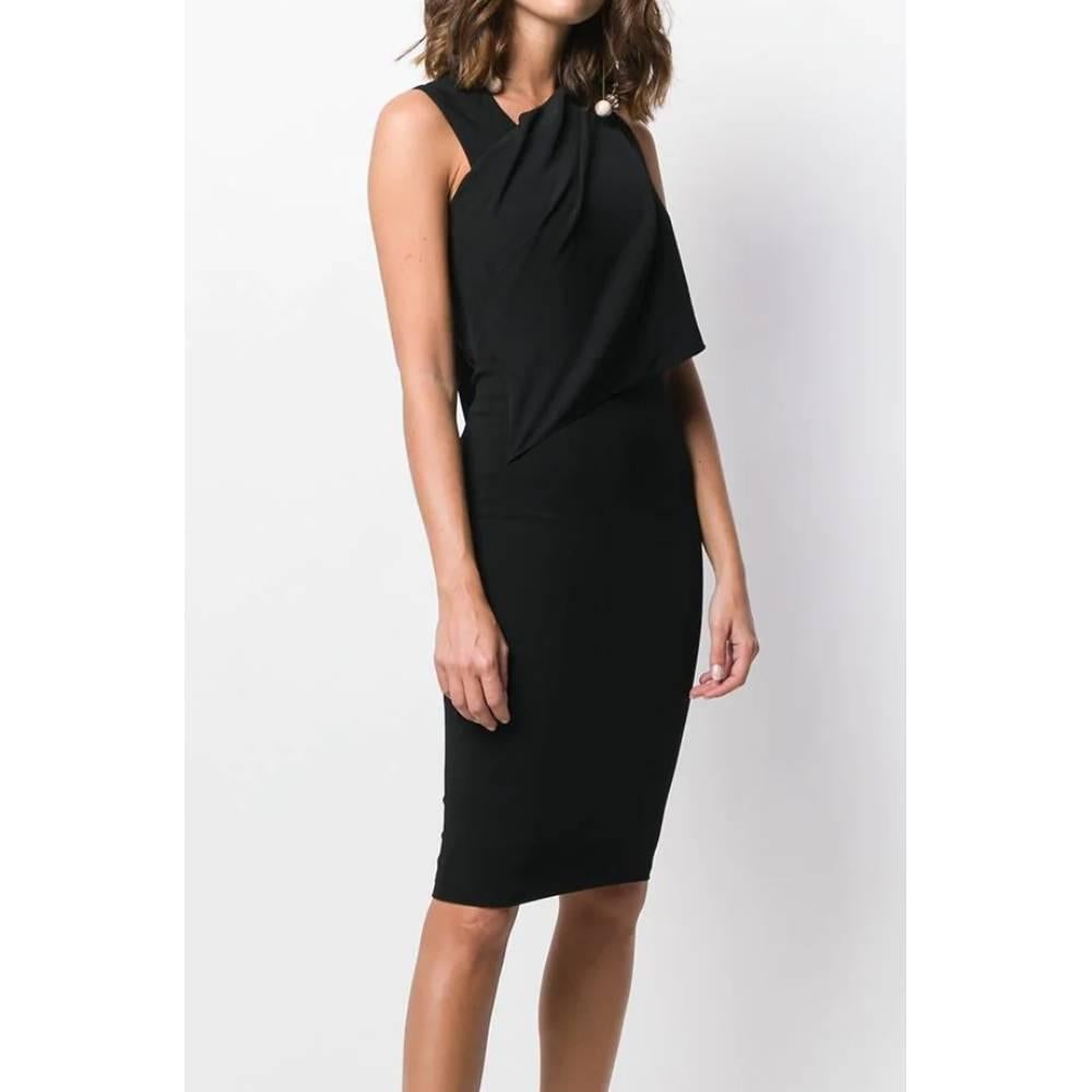 Givenchy black midi dress with asymmetrical neckline and large front drape and curl on the back, without sleeves. Fitted model and knee length.
Years: 2000s

Made in Italy

Size: 36 FR

Linear measures

Lenght: 100 cm
Bust: 40 cm 
Waist: 35 cm 
Hip: