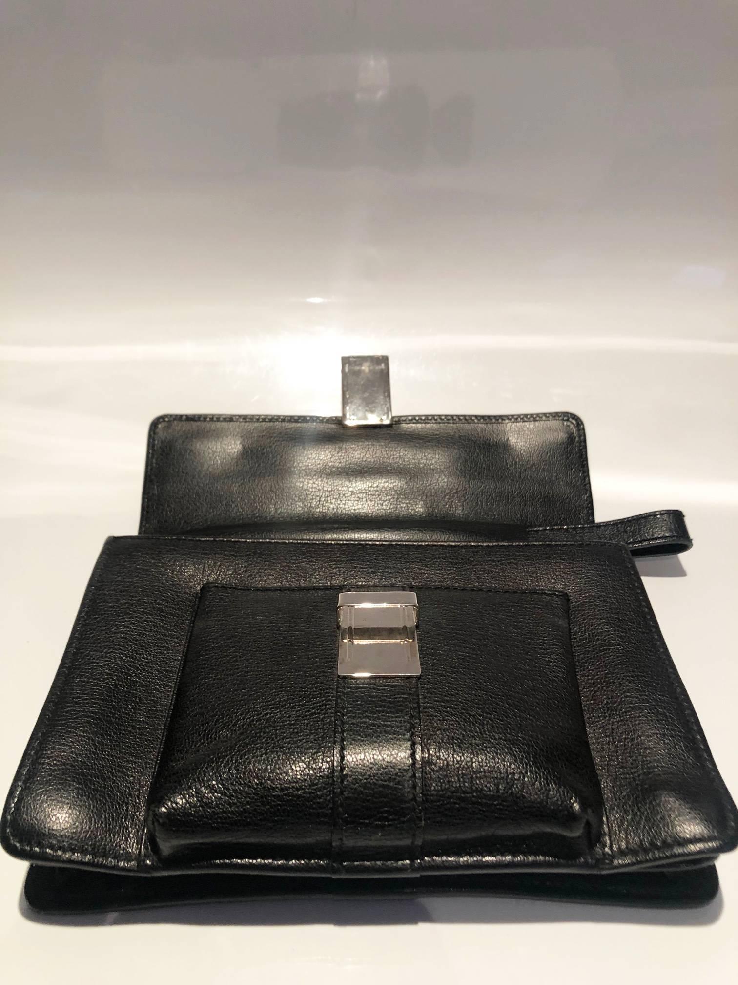 Women's or Men's 2000s Gucci Black Leather Steel Logo Clutch Wrist Bag