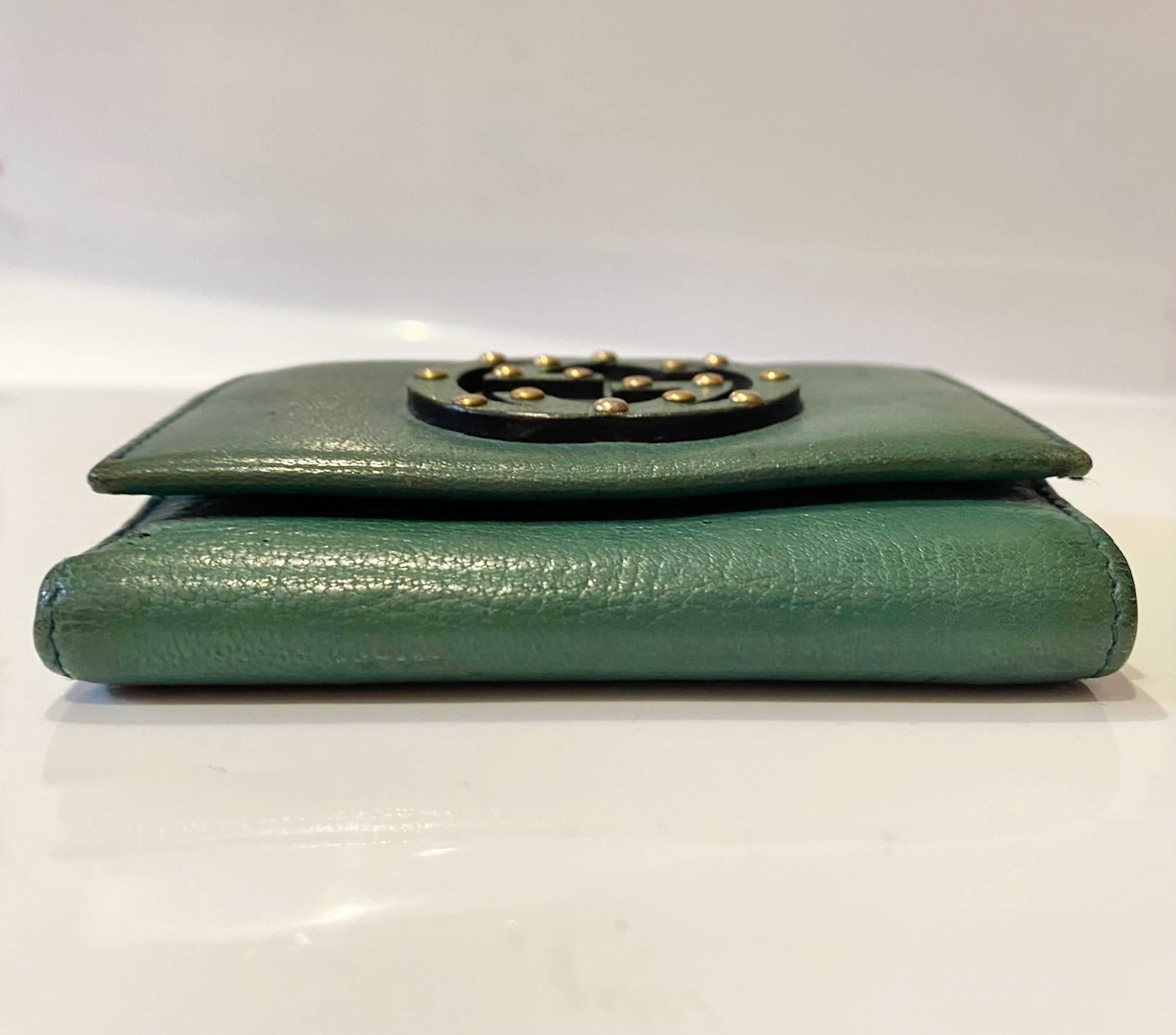 green leather wallets