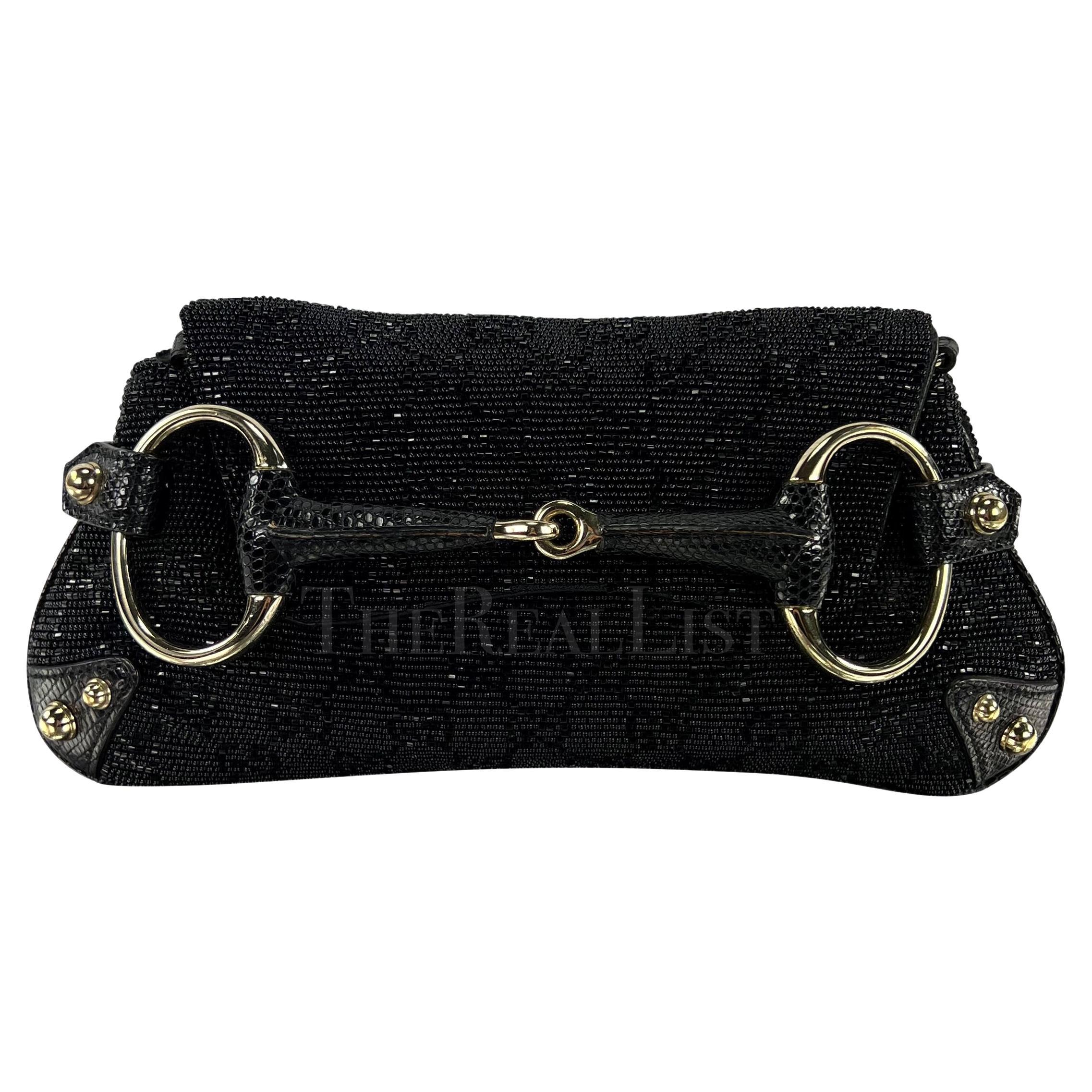TheRealList present: a black beaded GG Gucci horse-bit bag, designed by Tom Ford. From the early 2000s, this classic Ford horse-bit bag style is made complete with beading with Gucci's emblematic 'GG' pattern and chic lizard accents. This versatile
