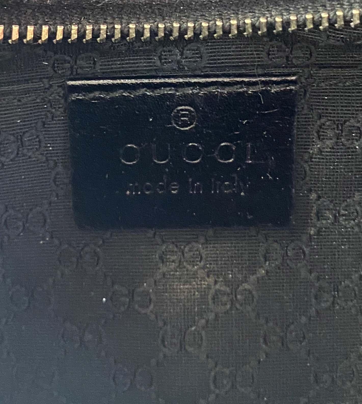 2000s Gucci by Tom Ford Black Satin Hoop Mini Wristlet In Good Condition For Sale In West Hollywood, CA