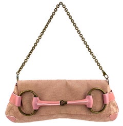 2000s Gucci by Tom Ford Pink GG Large Distressed Horsebit Convertible Clutch