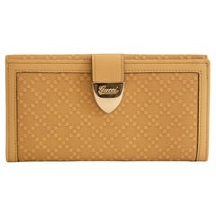 2000s Gucci Continental Wallet in Beige Fabric