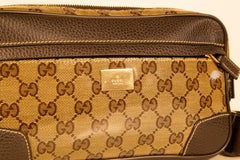 2000s Gucci GG Crystal PVC and Brown Leather Belt Bag