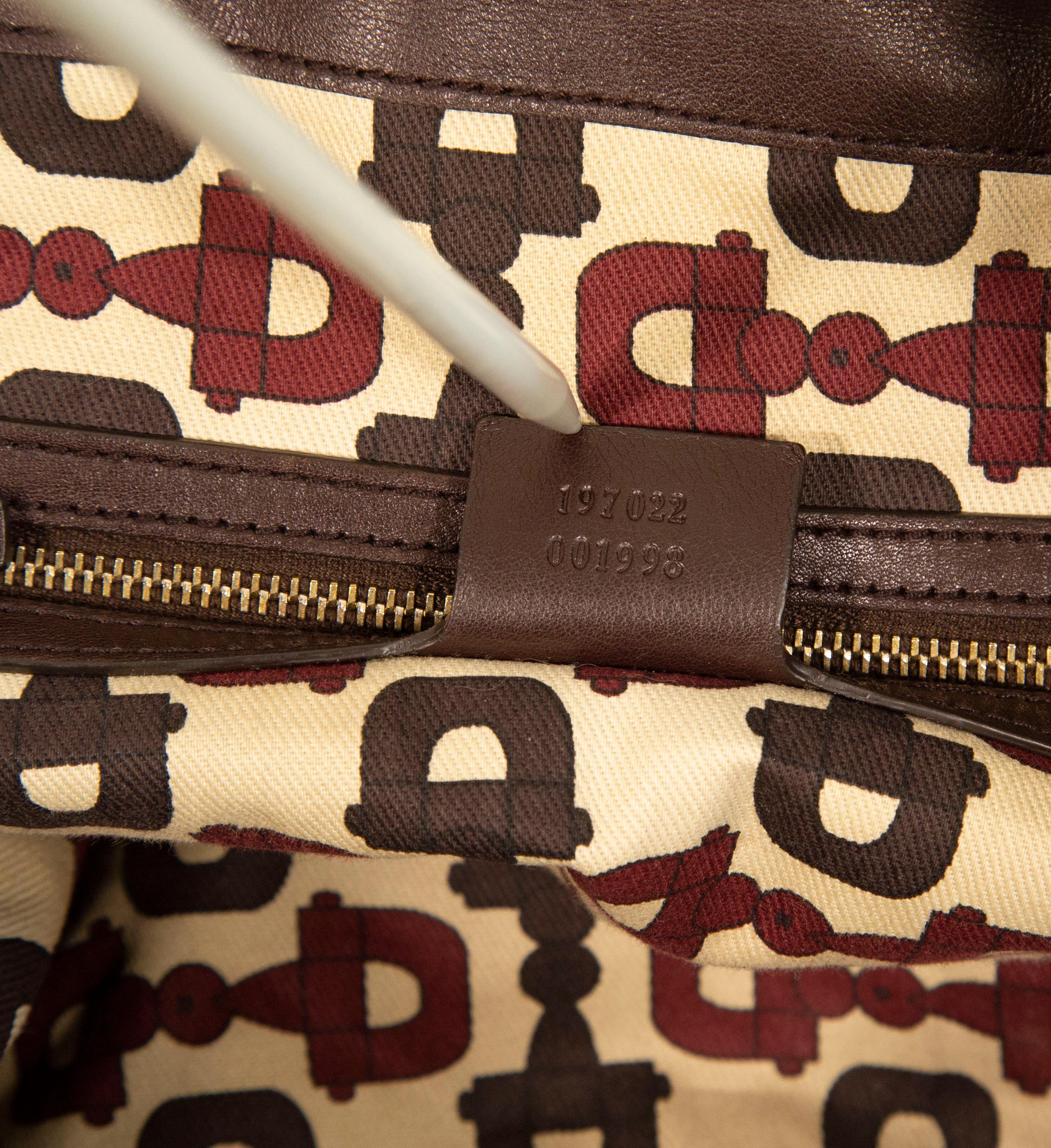 2000s Gucci GG Embossed Brown Leather Hysteria Handbag For Sale 7