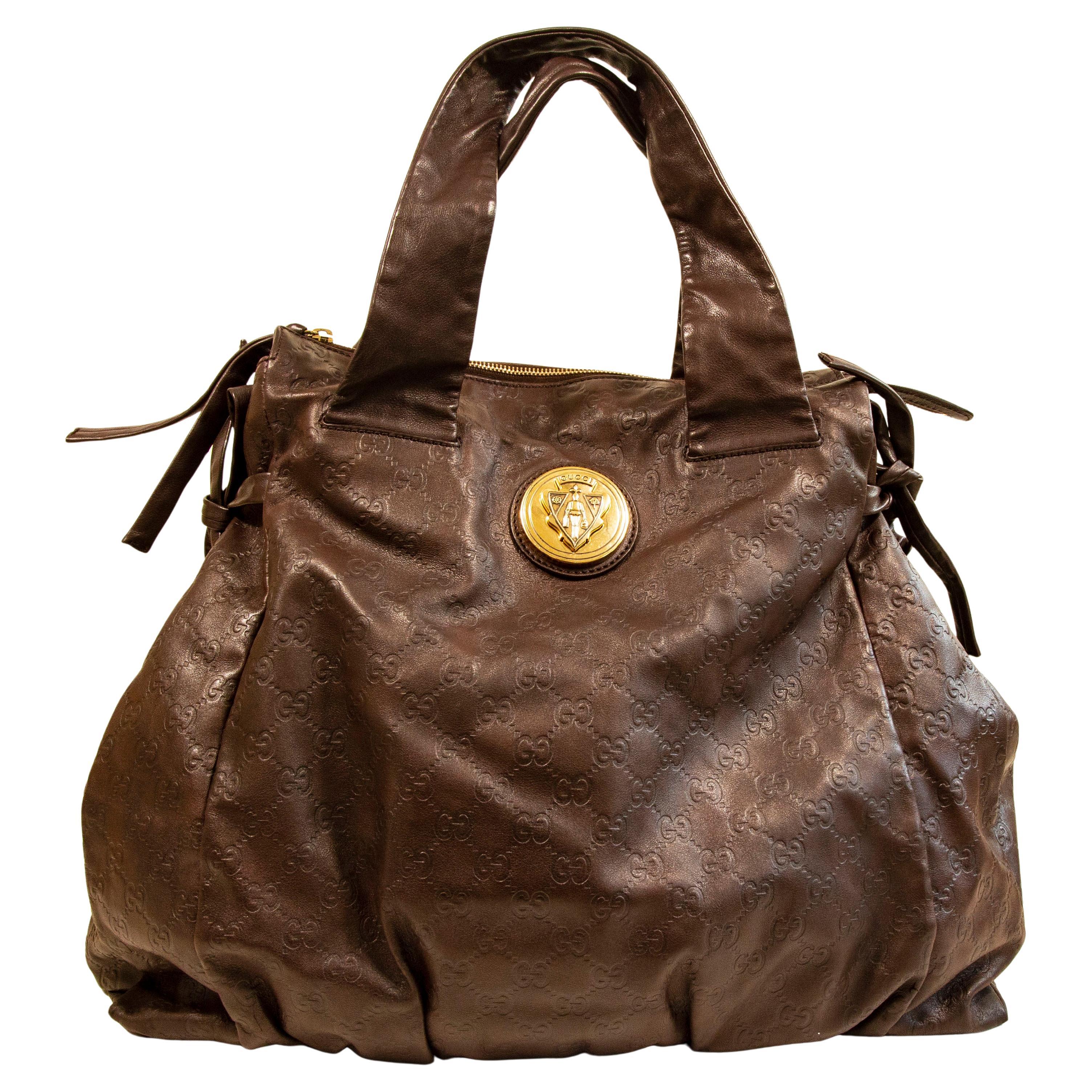 2000s Gucci GG Embossed Brown Leather Hysteria Handbag For Sale