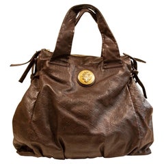 2000s Gucci GG Embossed Brown Leather Hysteria Handbag