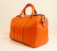 2000s Gucci Orange GG Embossed Leather Boston Bag