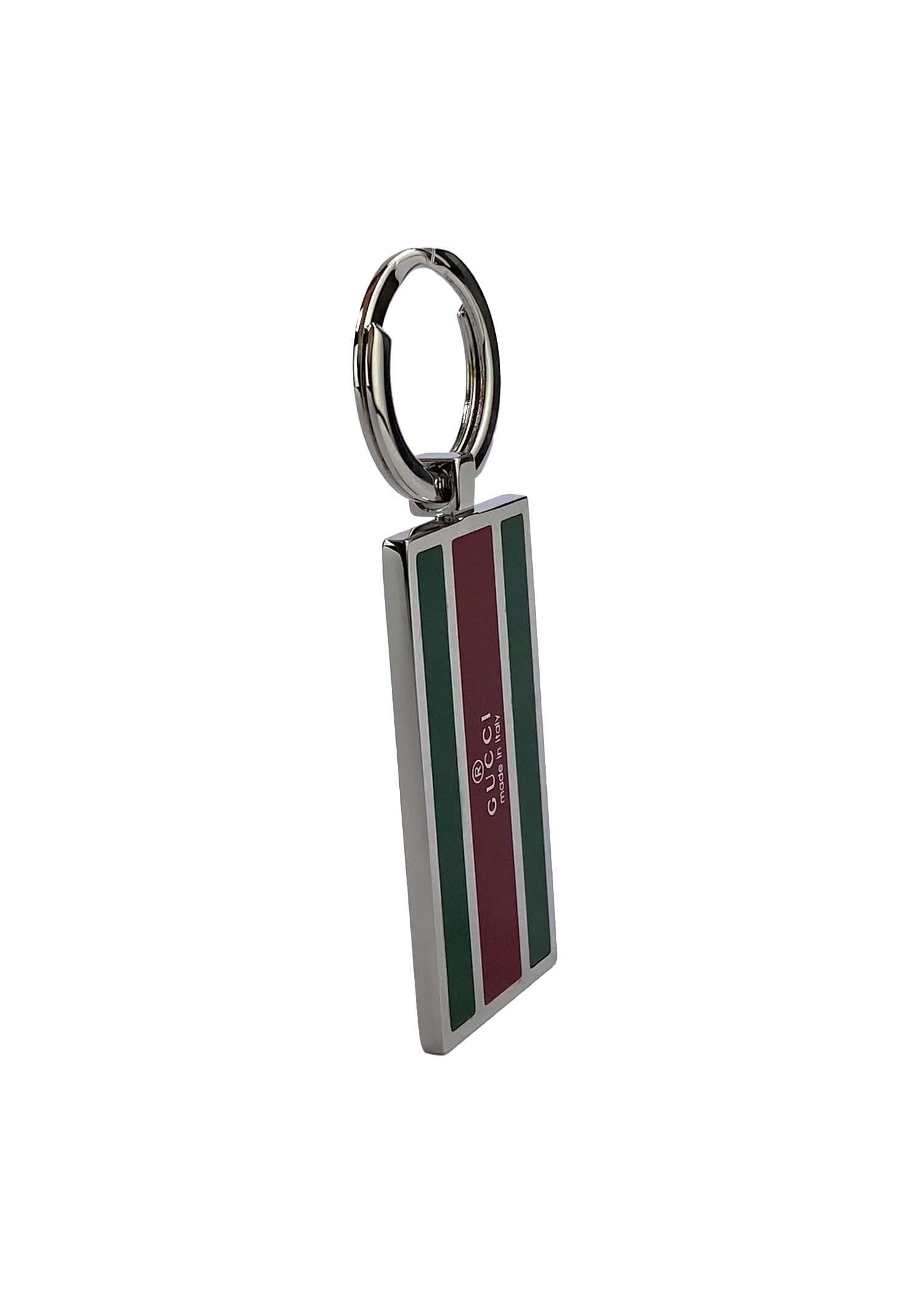 TheRealList presents: a Gucci silverplate green and red enamel Gucci keyring with its original box. The enamel detailing creates the house of Gucci's signature web stripe pattern. 

Follow us on Instagram! @_the_reallist_
