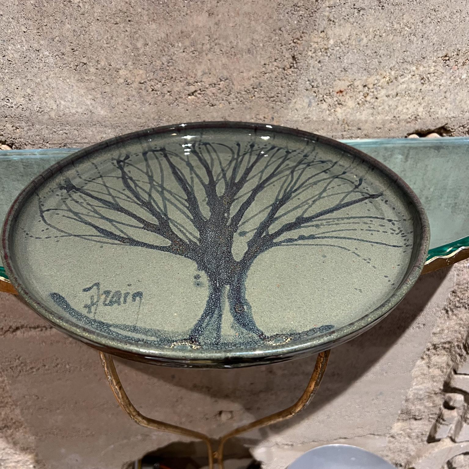 Abstract Tree of Life Studio Art Plate hand thrown pottery
13.5 diameter x 1 d
signed, T Frain Tim Frain
Preowned vintage unrestored condition, please see images provided.