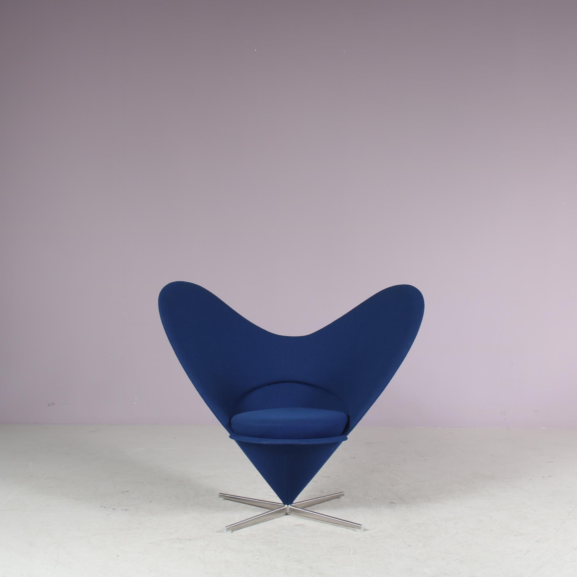 An iconic “Heart Cone” chair, originally designed by Verner Panton in 1958, manufactured by Vitra in Germany in the 2000s.

This eye-catching piece has a highly recognizable design, an iconic piece by statement designer Verner Panton! The coned