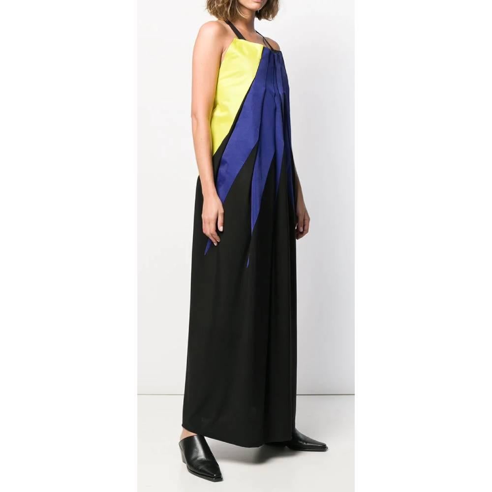 Issey Miyake long dress blue, black and yellow. Sleeveless and front square neckline and cross design on the back. Ankle length.

Years: 2000s

Size: 2 US (38 IT)

Linear measures

Height: 128 cm
Bust: 50 cm