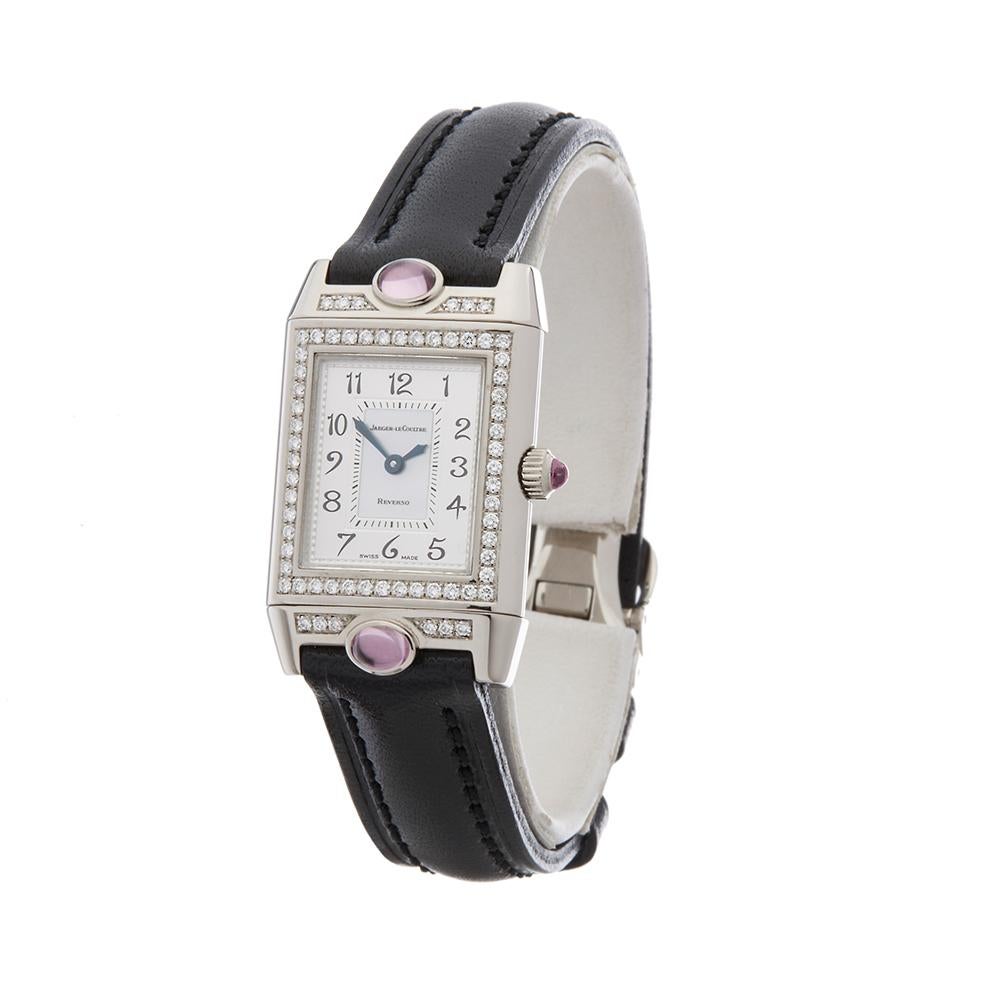 Contemporary 2000s Jaeger-LeCoultre Reverso Joaillerie White Gold 267.3.86 Wristwatch
 *
 *Complete with: Box Only dated 2000s
 *Case Size: 21mm By 33mm
 *Strap: Pink Crocodile Leather
 *Age: 2000's
 *Strap length: Adjustable up to 17cm. Please note