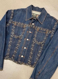2000s Jean Paul Gaultier pierced patchwork denim jacket