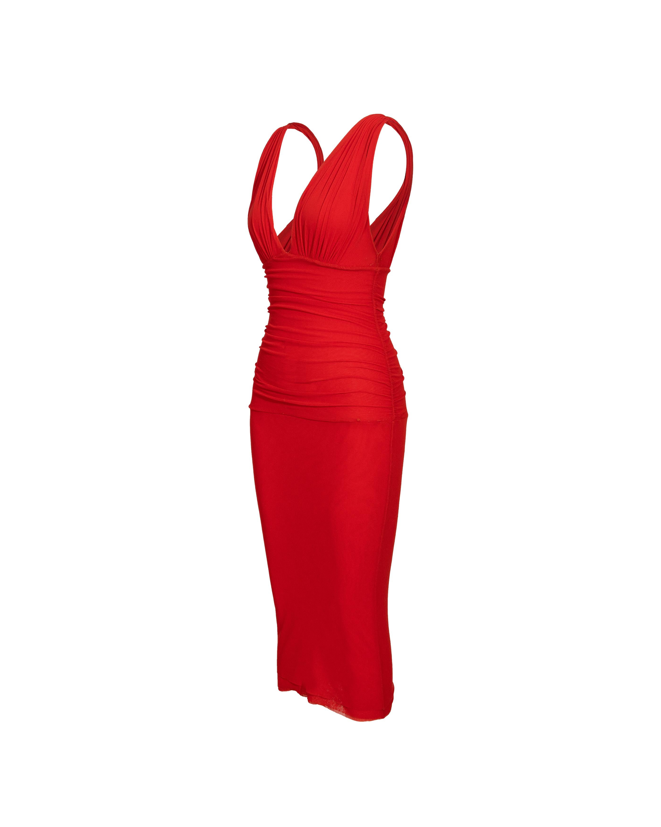 2000's Jean Paul Gaultier 'Soleil' red below-knee sleeveless dress. V-neck dress with gathered, fitted drop waist and gathered straps. Fabric Contents: 100% Nylon (feels like stretch mesh). Raw hemline with three layers of fabric creating beautiful