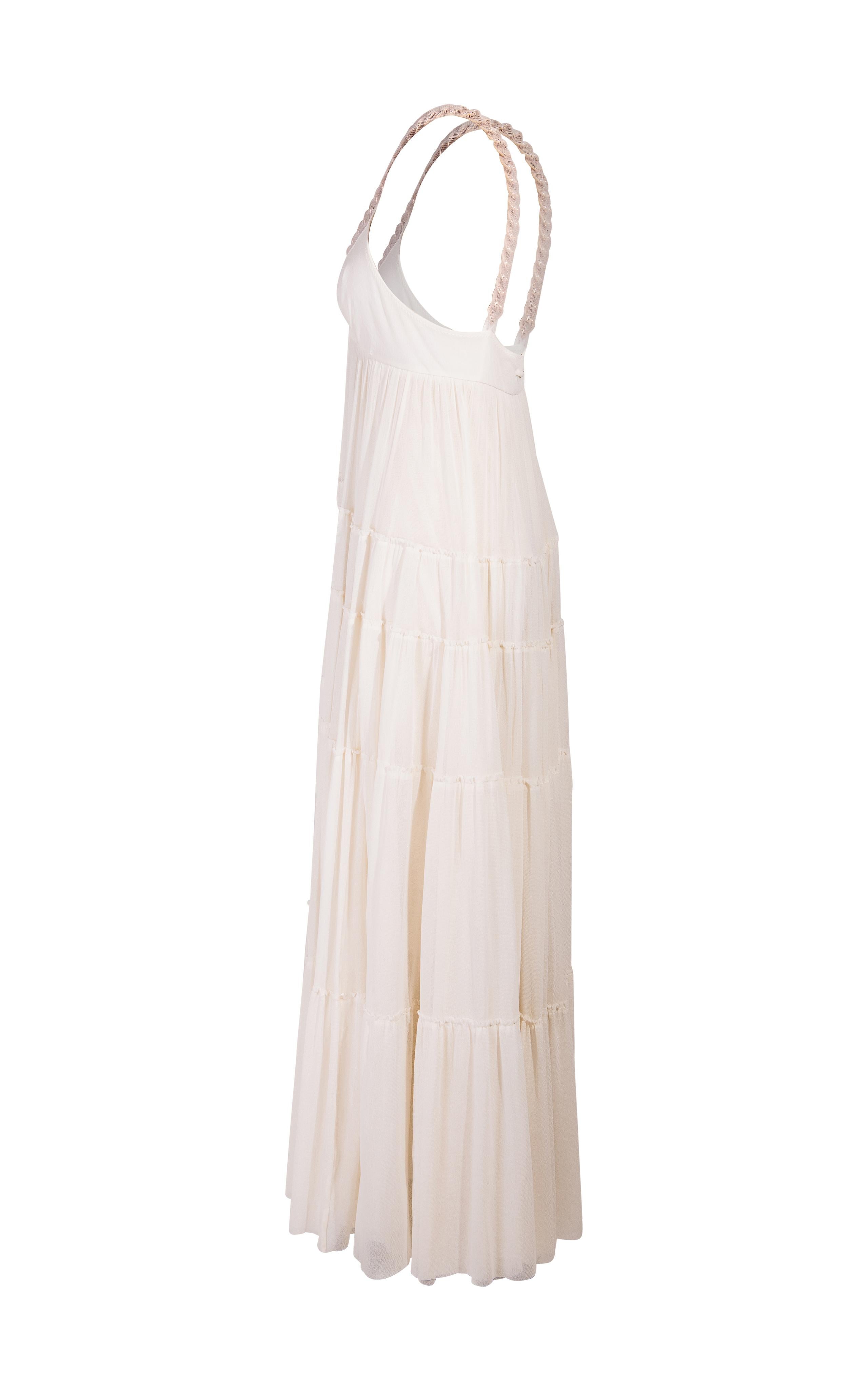 2000's Jean Paul Gaultier 'Soleil' off-white ruffle dress with gold tone chain-link strap accents. V-neck nylon mesh dress with tiered full skirt. White mesh overlay covers chain straps. Features elastic band underneath bust. Moderate stretch