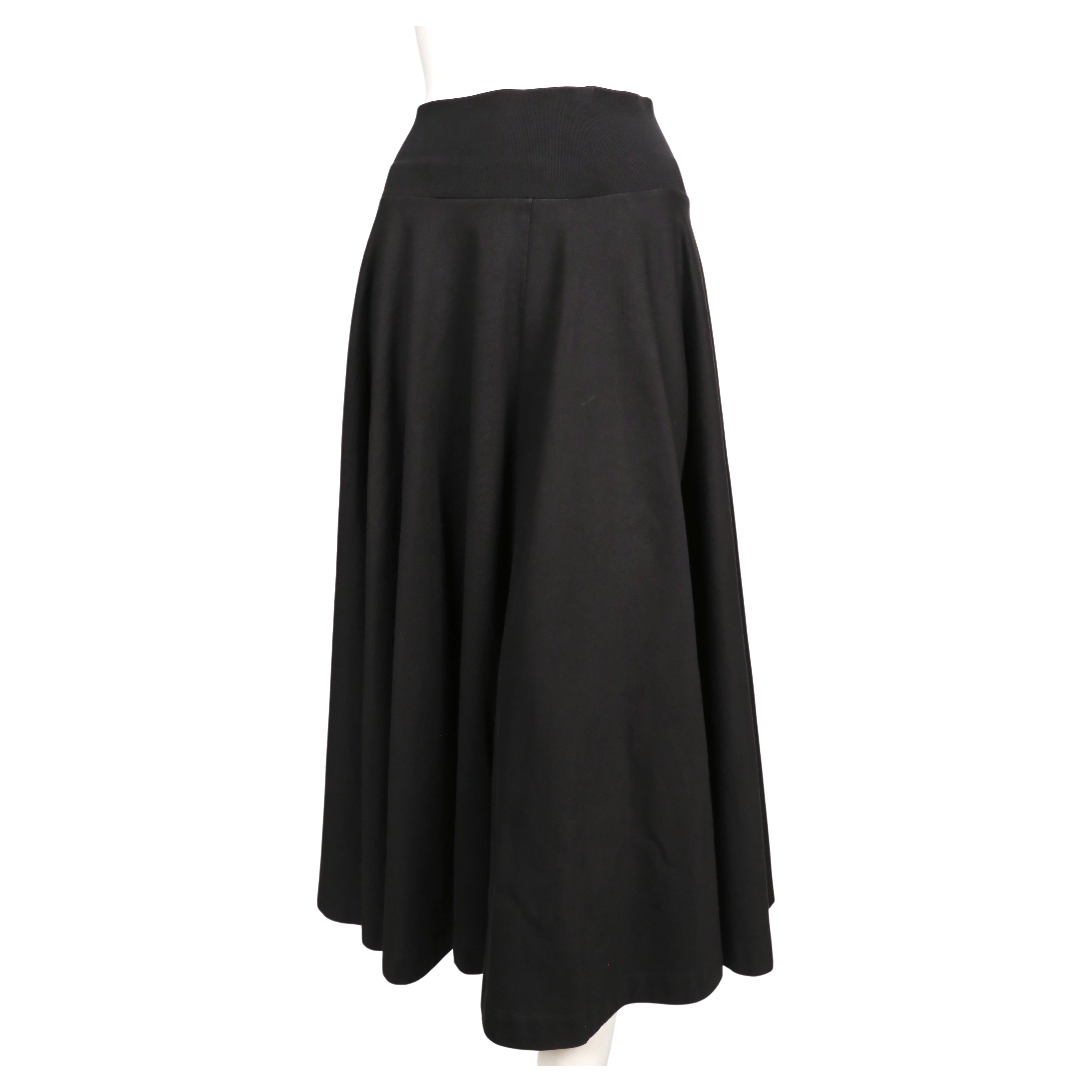 Black cotton twill circle skirt by Jil Sander dating to the 2000's. Size M. Skirt was not clipped on French size 36 mannequin. Approximate measurements: waist 26.5
