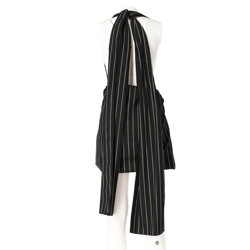 Jil Sander black pinstriped blend wool dress. Gathered waistband and adjustable front bands.

Size: 34 FR

Flat measurements
Height: 36 cm
Waist: 52 cm

Product code: X0341

Composition: 98% Wool - 2% Elastane

Made in: Italy

Condition: Very good