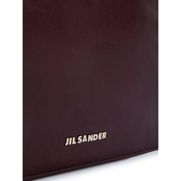 2000s Jil Sander Burgundy Leather Clutch In Good Condition For Sale In Lugo (RA), IT