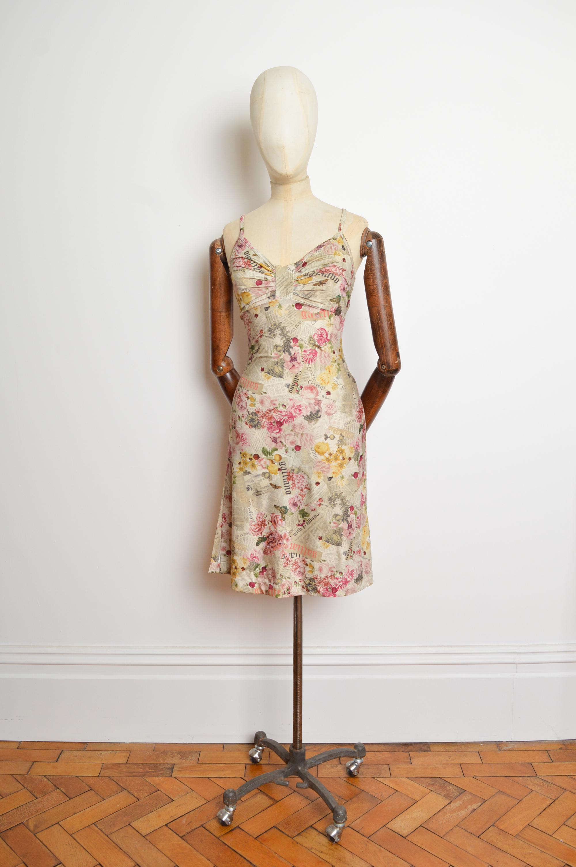 A beautiful Vintage Galliano 2000s Slip dress in the iconic antique floral gazette pattern, featuring strappy shoulders, stretchy figure hugging silhouette, gathering at the bust and to the knee length hem
Recommended Size; UK 10 (stretchy will fit