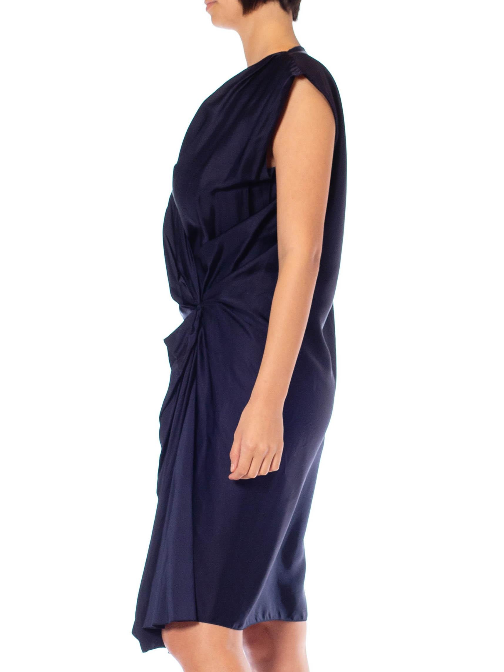 The raw deconstructed areas of this dress are part of the design and are not flaws 2000S Lanvin Navy Blue Silk Satin Deconstructed Wrap Dress 