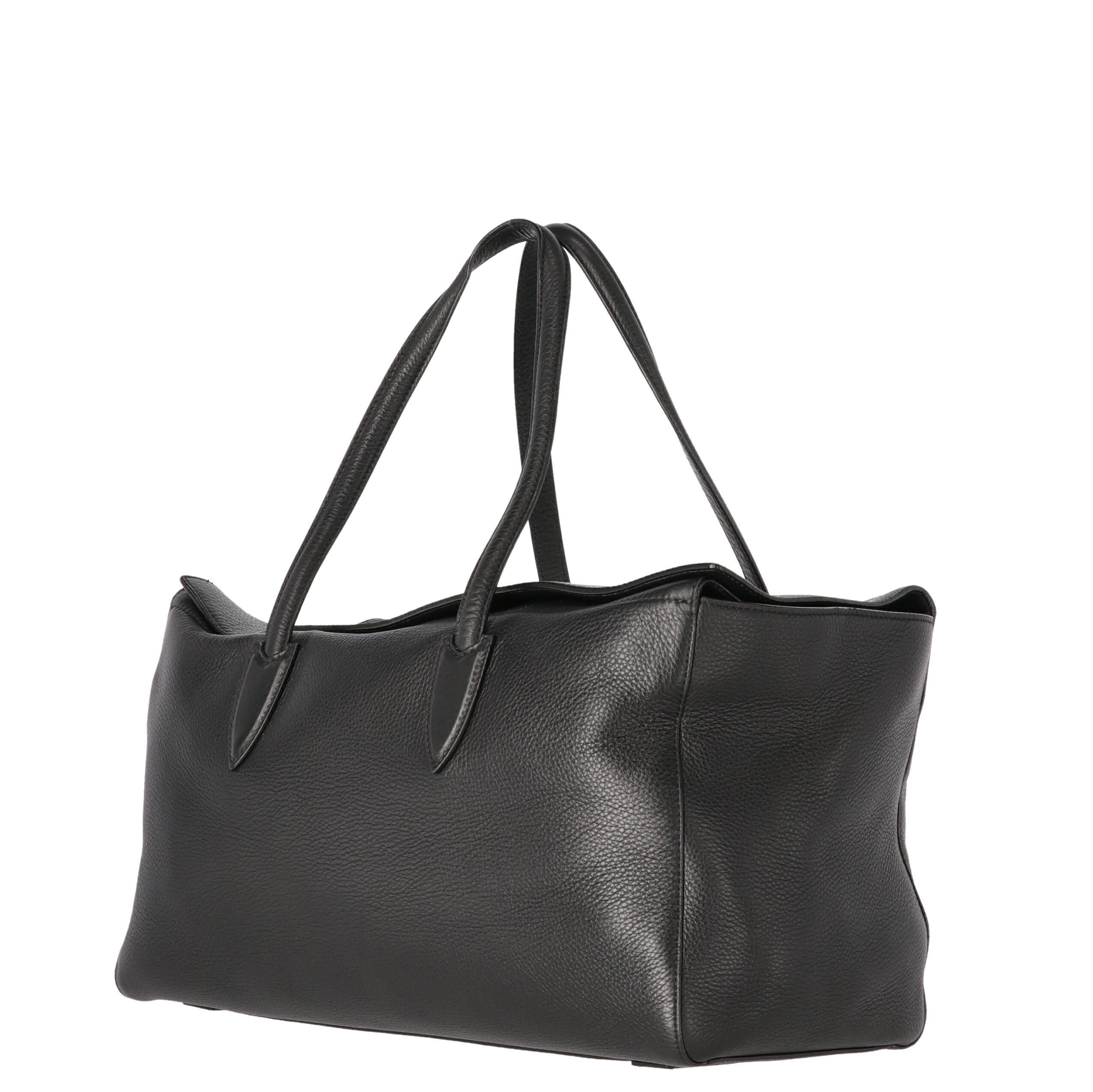 Max Mara black soft genuine leather rectangular tote bag. Two leather handles and double flap with printed gold-tone logo and four invisible magnets closure. Fully lined in cream colored suede. Wide and cushy, to carry everythig you need.

Years: