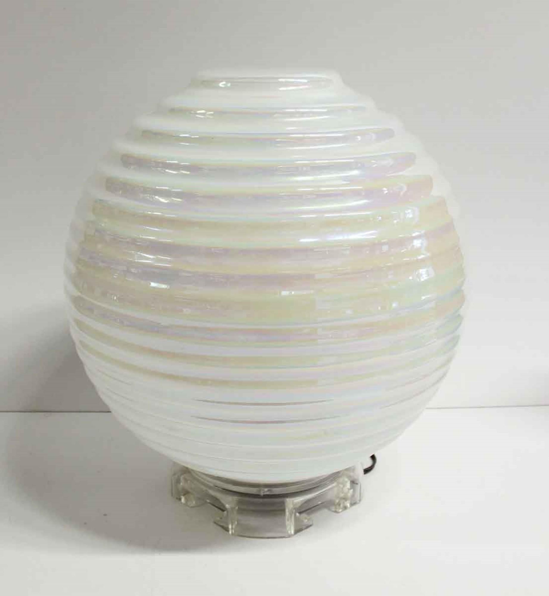 2000s hand blown Mid-Century Modern opalescent Murano glass table lamp with a clear Lucite and brass base. From Italy. Takes one bulb. This can be seen at our 333 West 52nd St location in the Theater District West of Manhattan.
