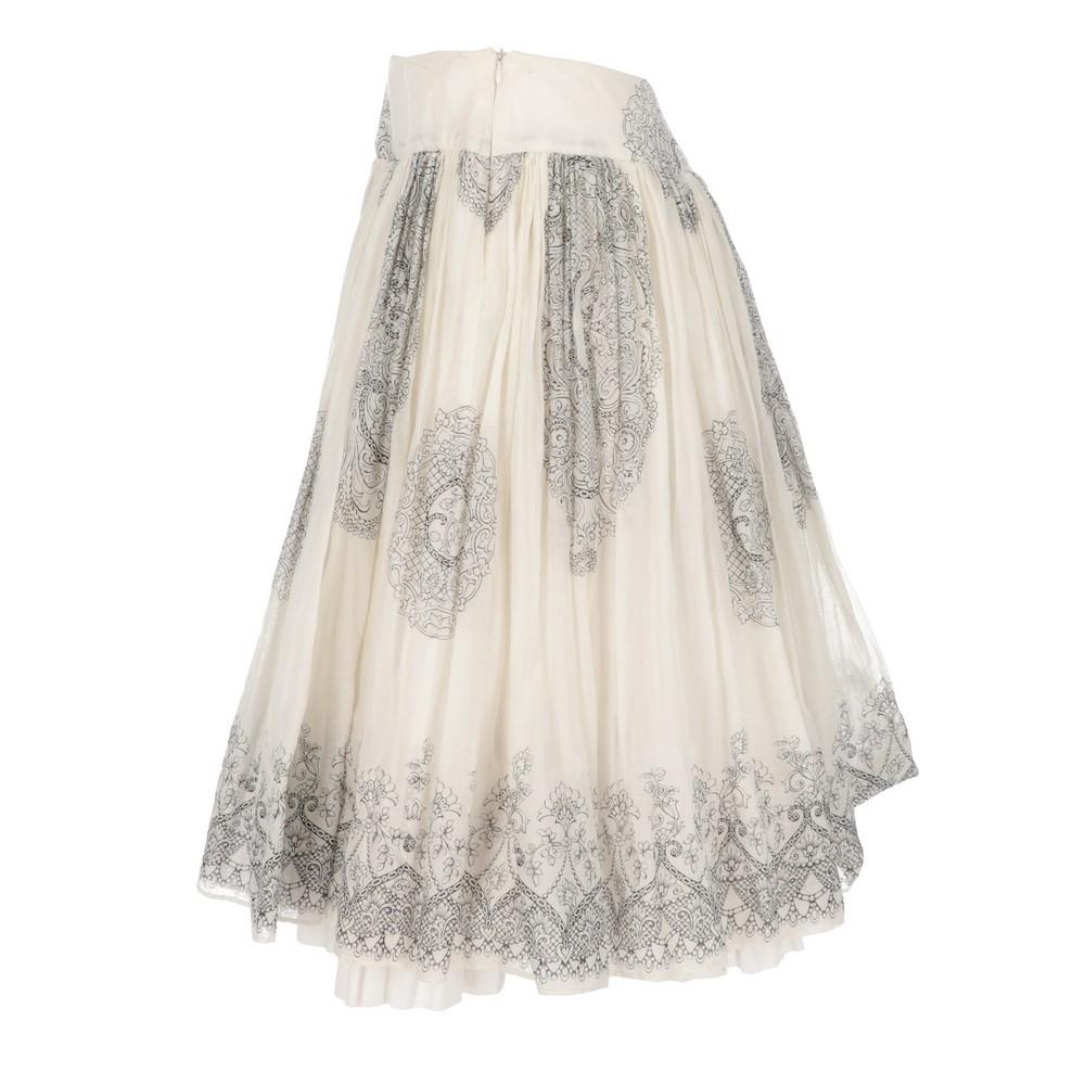 Miu Miu ivory polyester skirt with black paisley pattern. Concealed side zipper closure, pleated waist and layered design. Item shows signs of wear, as shown in the pictures.

Years: 2000’s

Made in Italy

Size: 42 IT

Flat measurements :

Height: