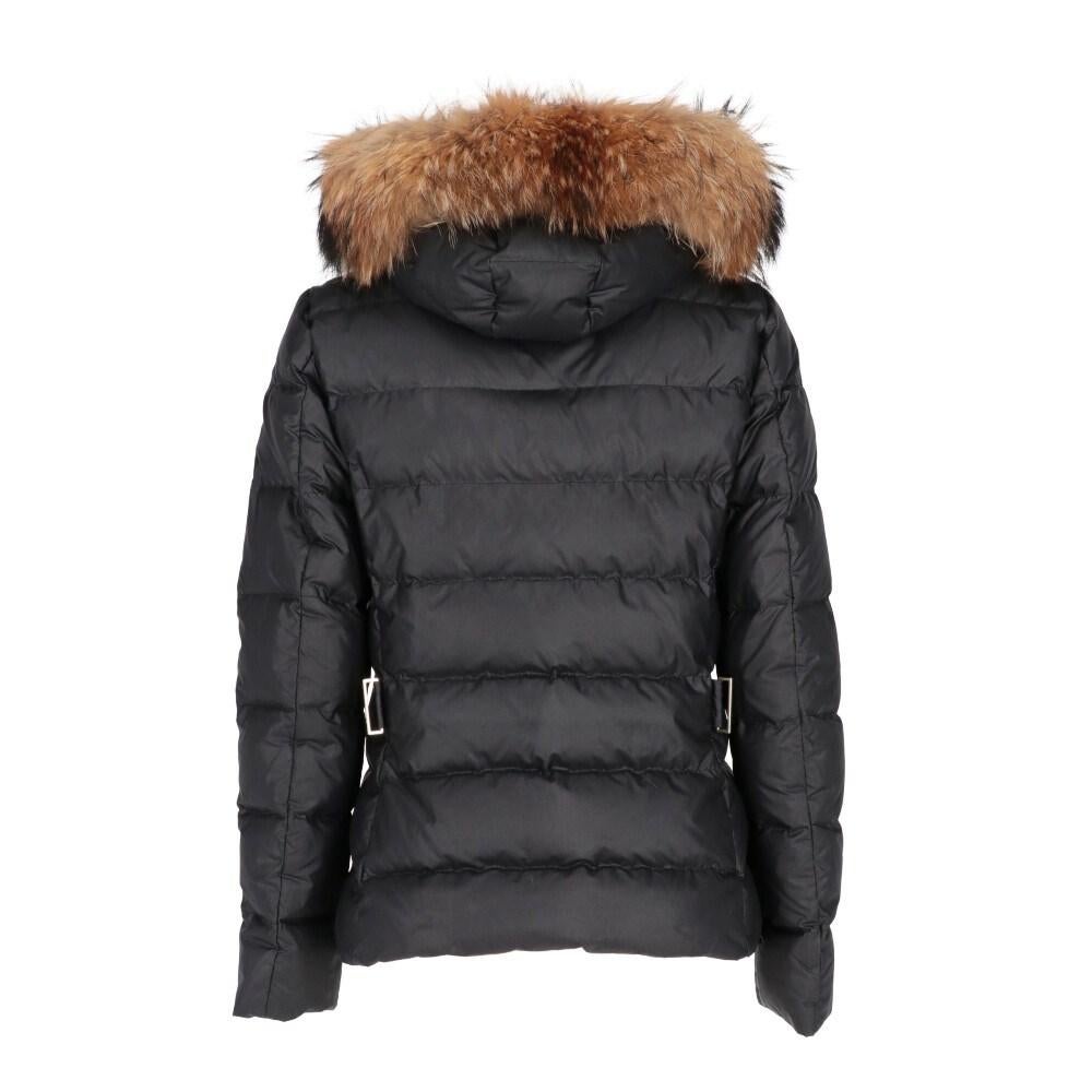 Moncler black down jacket with hood and removable real fur trim. Front gold-tone zip fastening, concealed side pockets with zip, and metal logo appliqué on the left sleeve.

Size: 2 / 44 IT

Flat measurements
Height: 60 cm
Bust: 50 cm
Shoulders: 40