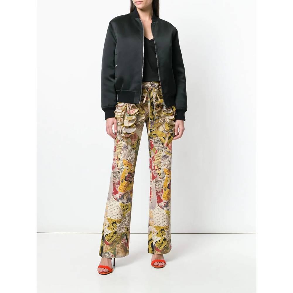 Moschino Jeans trousers in cotton blend with multicolored patchwork print and decorative ruffles. Front closure with hook and zip. Flared leg.
Years: 2000s

Made in Italy

Size: 46 IT

Flat measurements

Height: 108 cm
Waist: 39 cm 