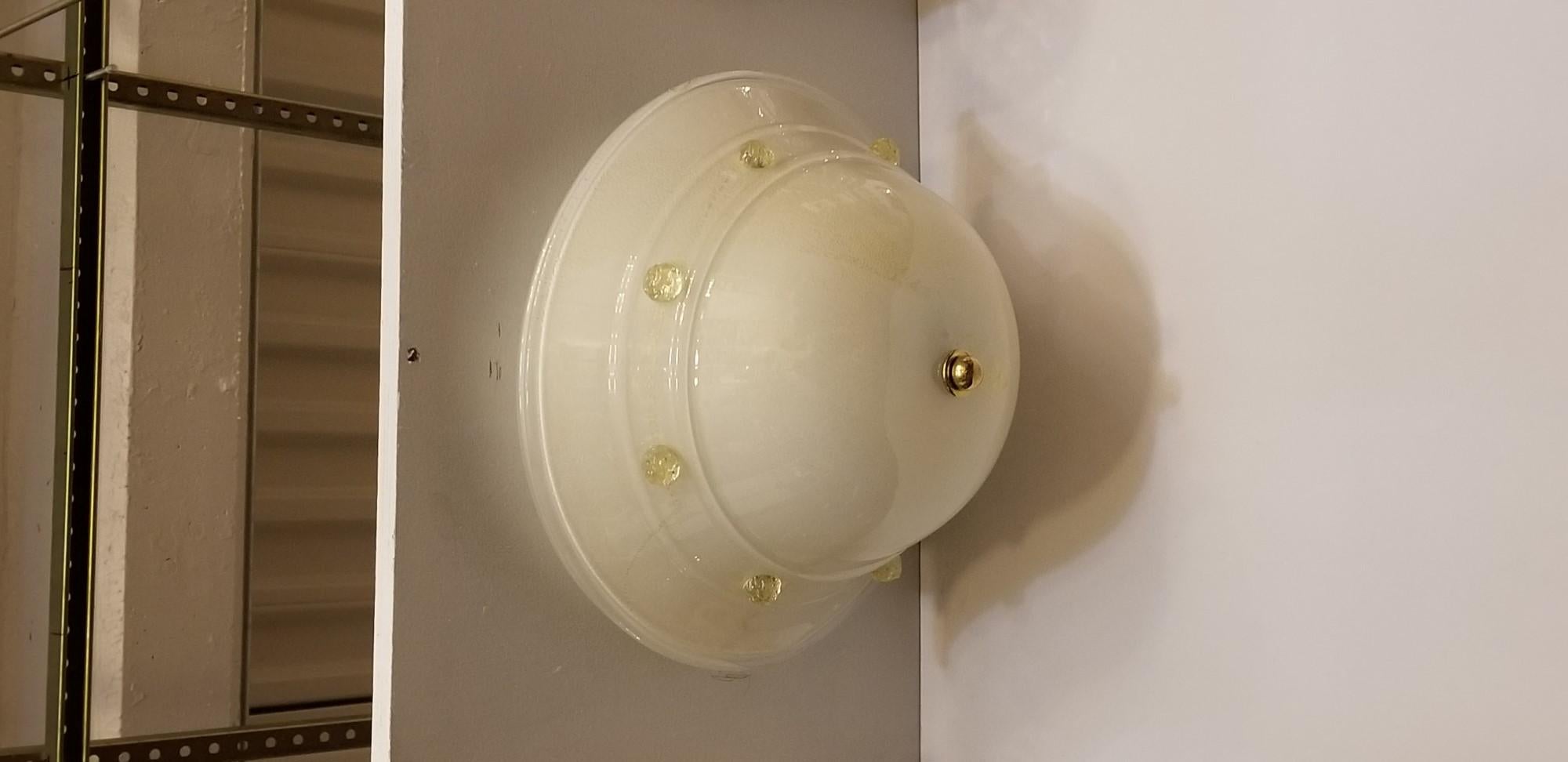 Hand blown Modern Murano opaline glass flush mount ceiling light. Off-white with gold flecks and tulip design. Made in Italy, 2000s. Cleaned and rewired. Small quantity available at time of posting. Priced each. Please inquire. Please note, this
