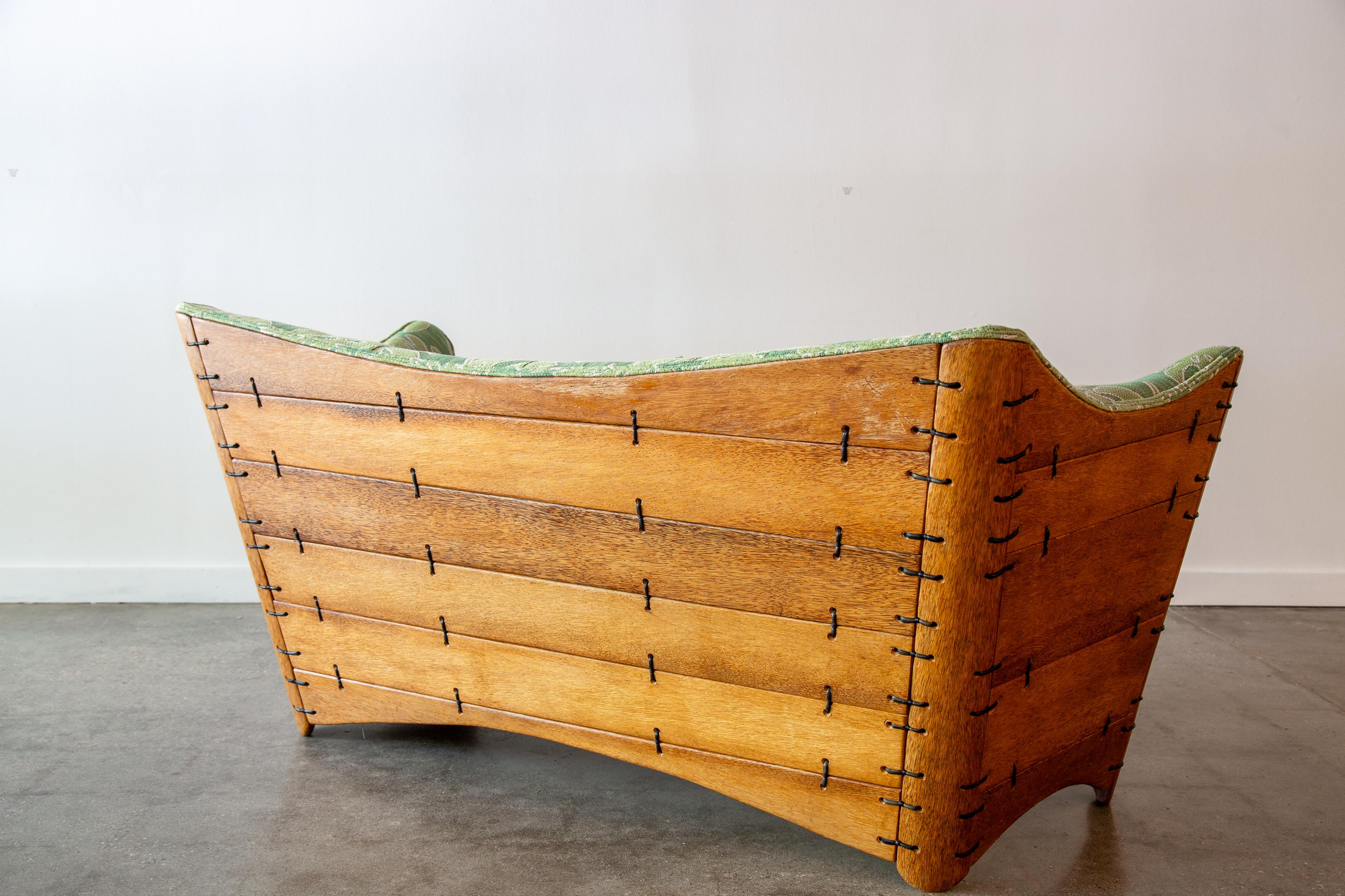 Pacific green is a sustainable furniture brand sourcing palm hardwood from non fruit producing palm trees in Fiji.  Designed after river rafts you would find in the jungle, the palm wood is laced together with leather.  Sculptural form reminiscent