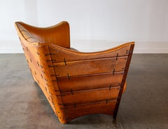 2000s Pacific Green "Cayenne" two seater Sofa Cognac Leather and Palm wood