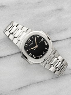 2000s Patek Philippe Nautilus 3800/1A Stainless Steel Black Roman Dial Auto 37mm