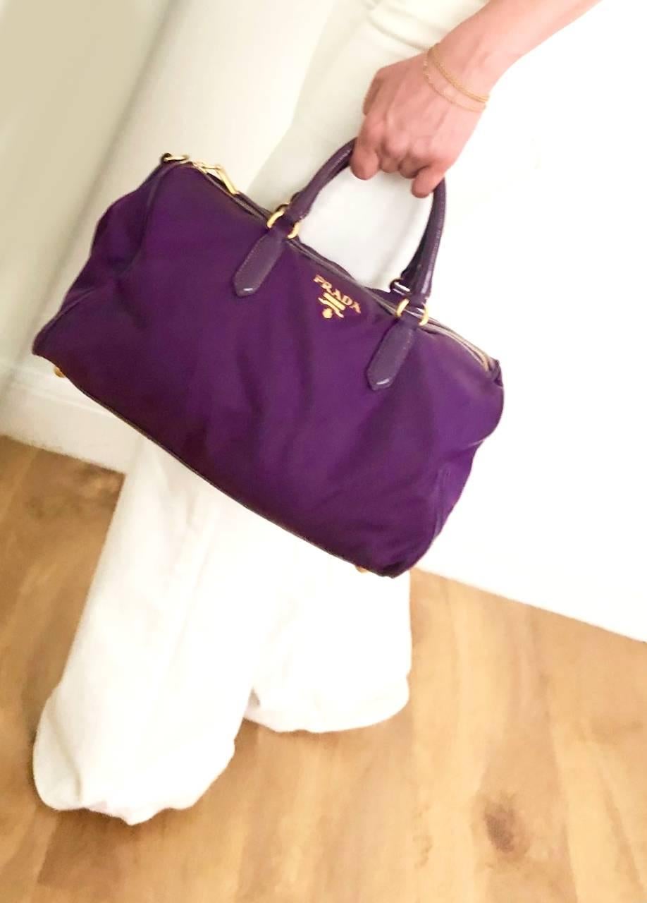 Prada Vintage Bandoliera Tessuto Purple Bag, collector's piece (out of production). Created by Miuccia Prada herself, Prada Tessuto has been noted as “one of the thickest” and “most durable” fabric on the market and can withstand almost anything,