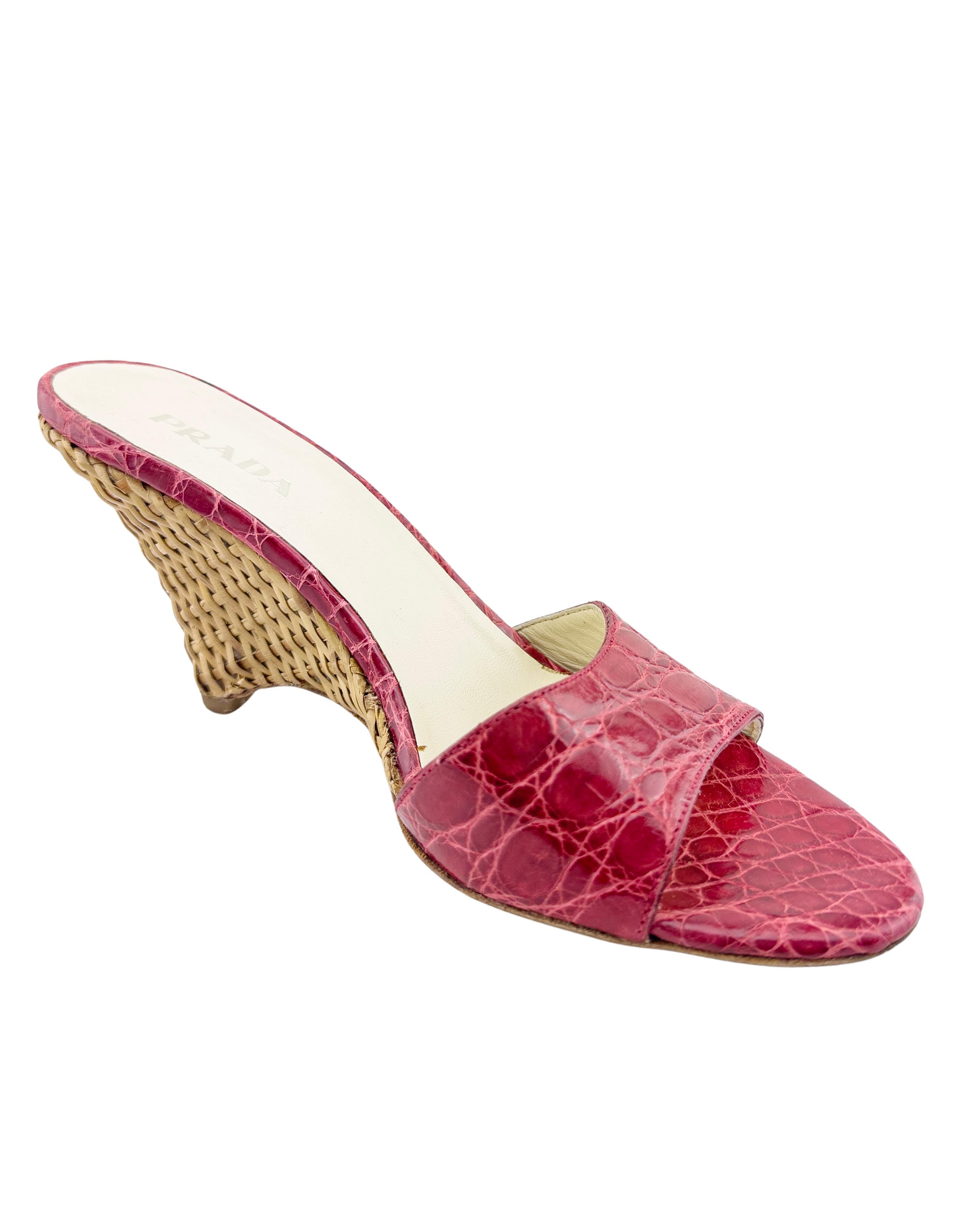 Mid 2000's fun and flirty shoes that remind you of a picnic. The brown woven wicker covered wedge heel is complemented by the bright red faux croc vamp. Wear to soles. Marked a IT 38.5, fits like a US 8.5.