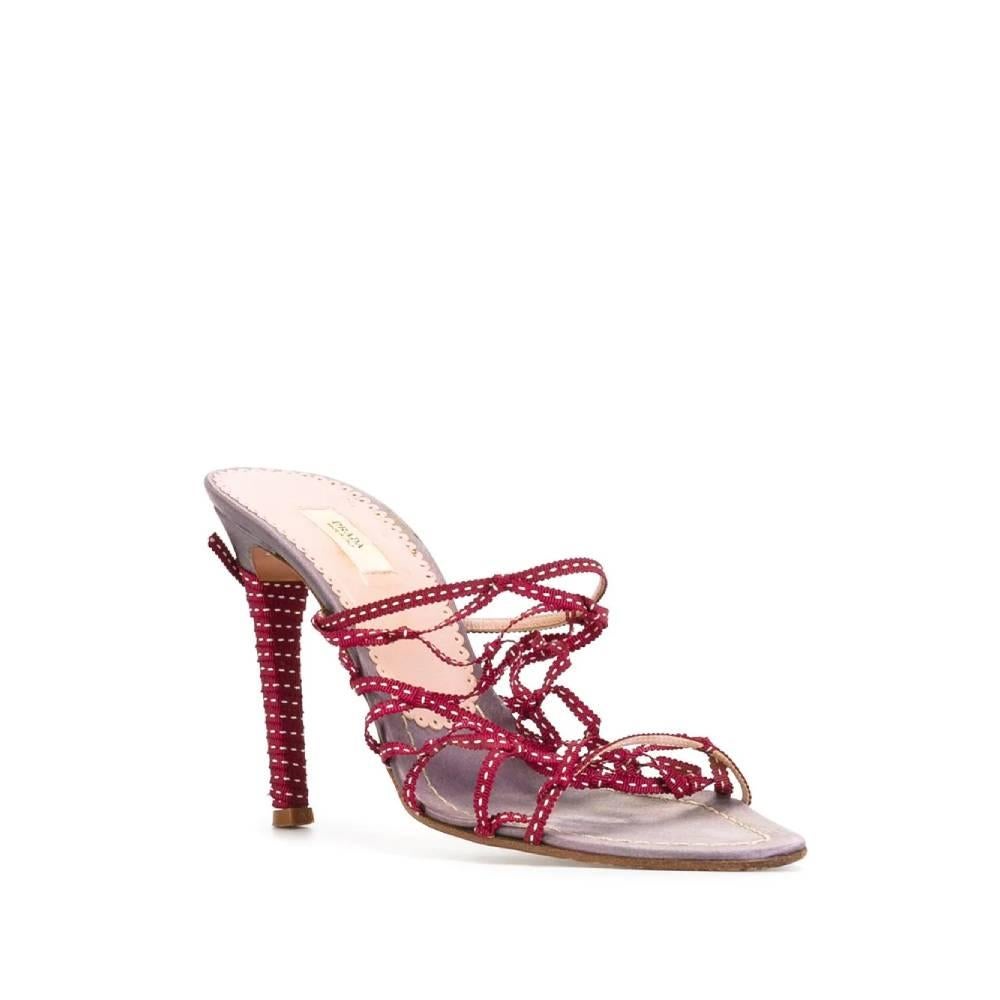 Prada sandals with burgundy cotton lace detail, open toe, insole with logo and high stiletto heel with braided ribbon.

Size: 38 EU  

Heel: 10 cm
Length insole: 25 cm

Product code: A5203

Composition: 
Sole: 100% Calf Leather
Lining: 100%