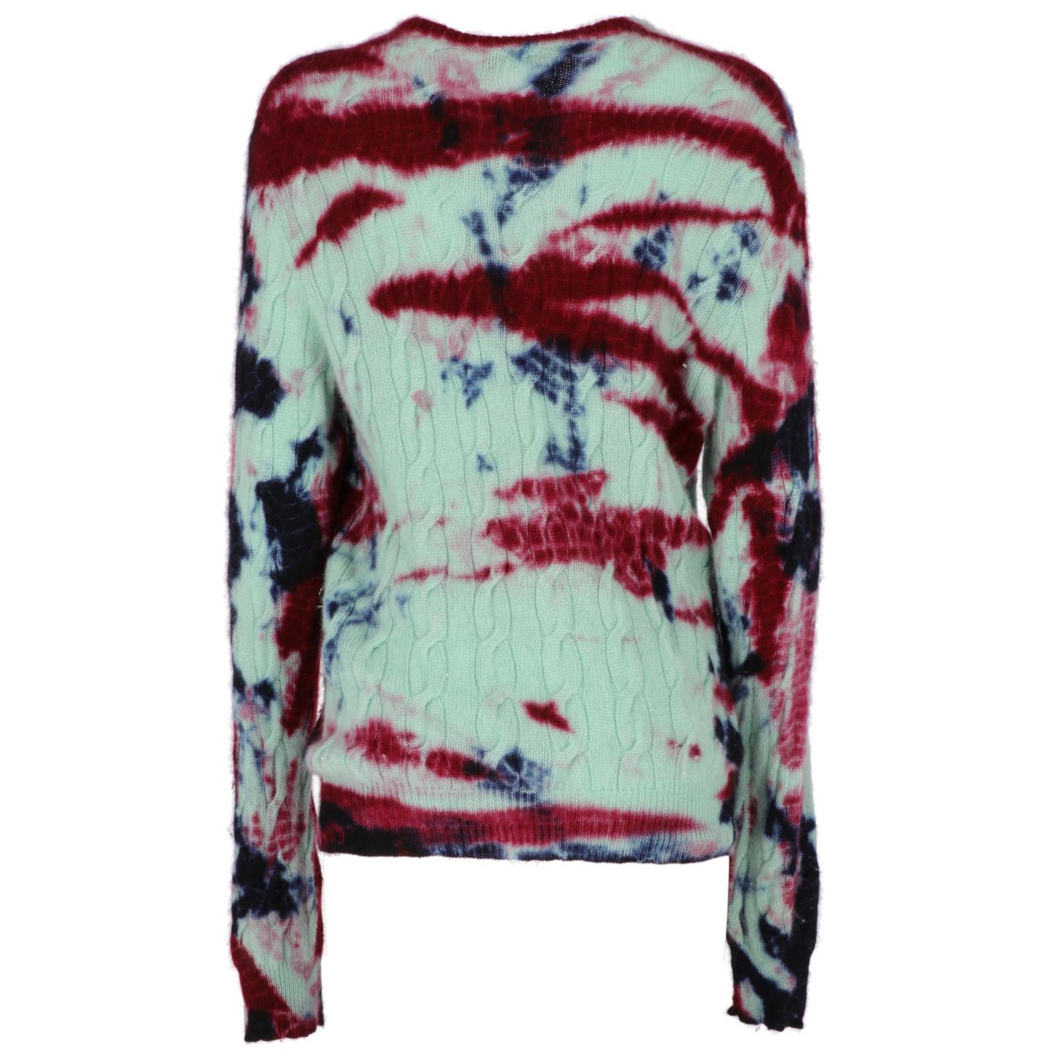 The Ralph Lauren braided sweater features a round neck, subsequently it has been subjected to a fuchsia, seafoam green and blue tones tie and dye treatment. 
Years: 2000s
Size: M IT

Linear measures

Height: 69,5 cm
Bust: 44 cm
Shoulder: 48