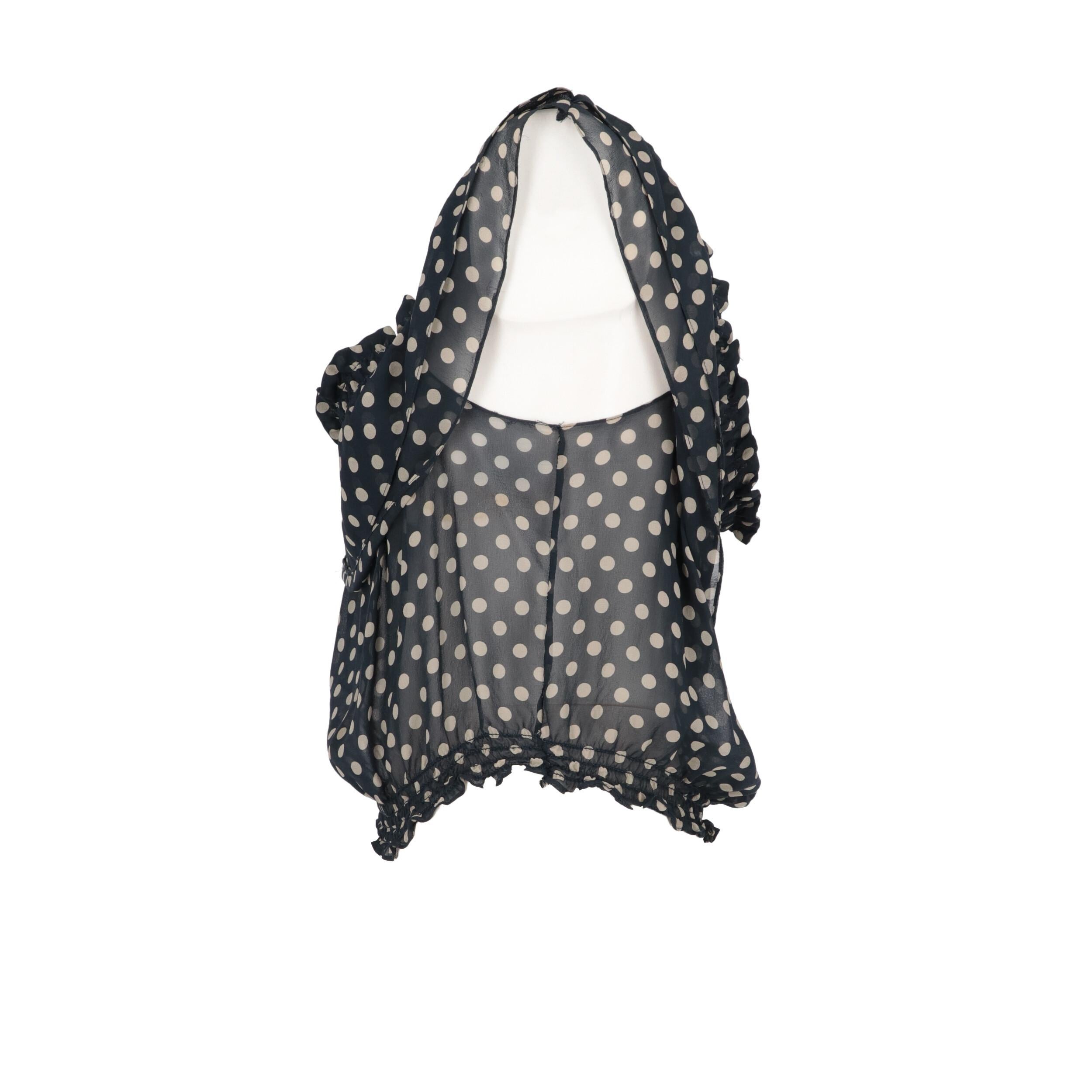 Ralph Lauren semi-transparent blue silk with gray polka dots short top. Model with boat neckline, bare shoulders and decorative flounces.
Years: 2000s 

Size: 42 IT

Flat measurements 

Height: 30 cm 
Bust: 43 cm