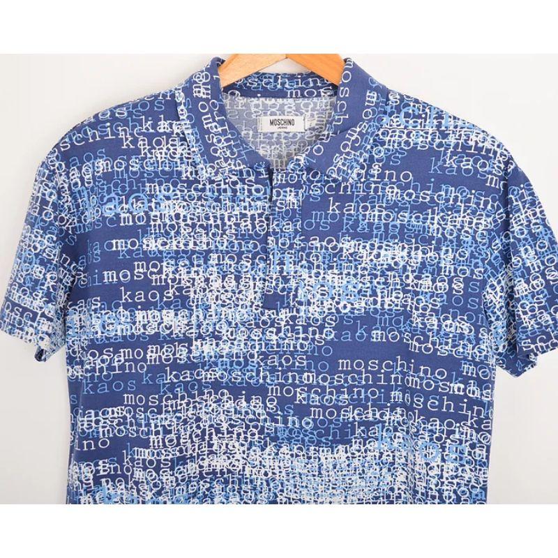 Vintage 2000's Moschino 'Kaos' print shirt.

This Cool, Short sleeved Polo in a mixed blue & white colour way has a repeat 'KAOS' spell out lettering pattern through out.   

Features:
Zip down collar
Short sleeves
Iconic 'Kaos' pattern
100%