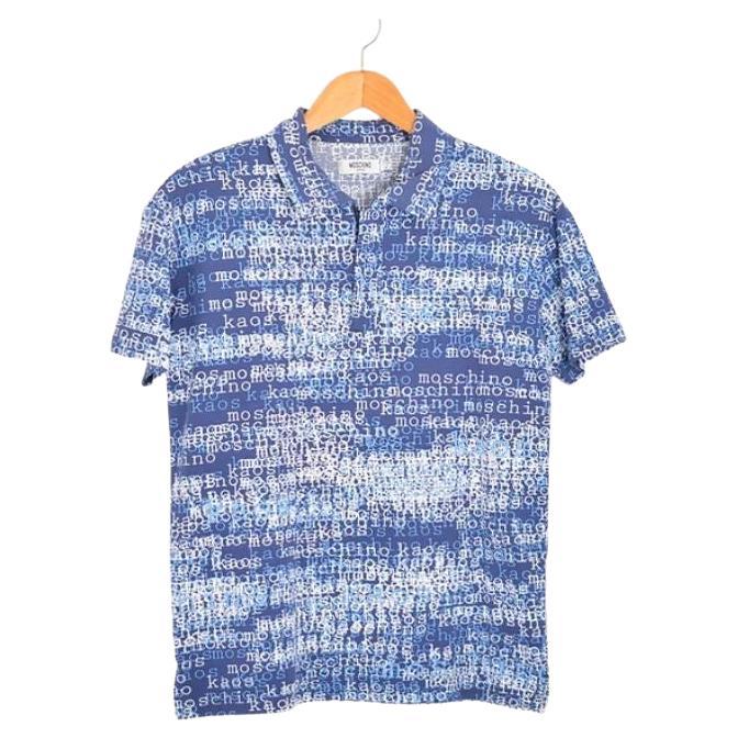 2000's Rave Era Vintage Moschino 'Kaos' Blue Abstract Word pattern Polo Shirt For Sale
