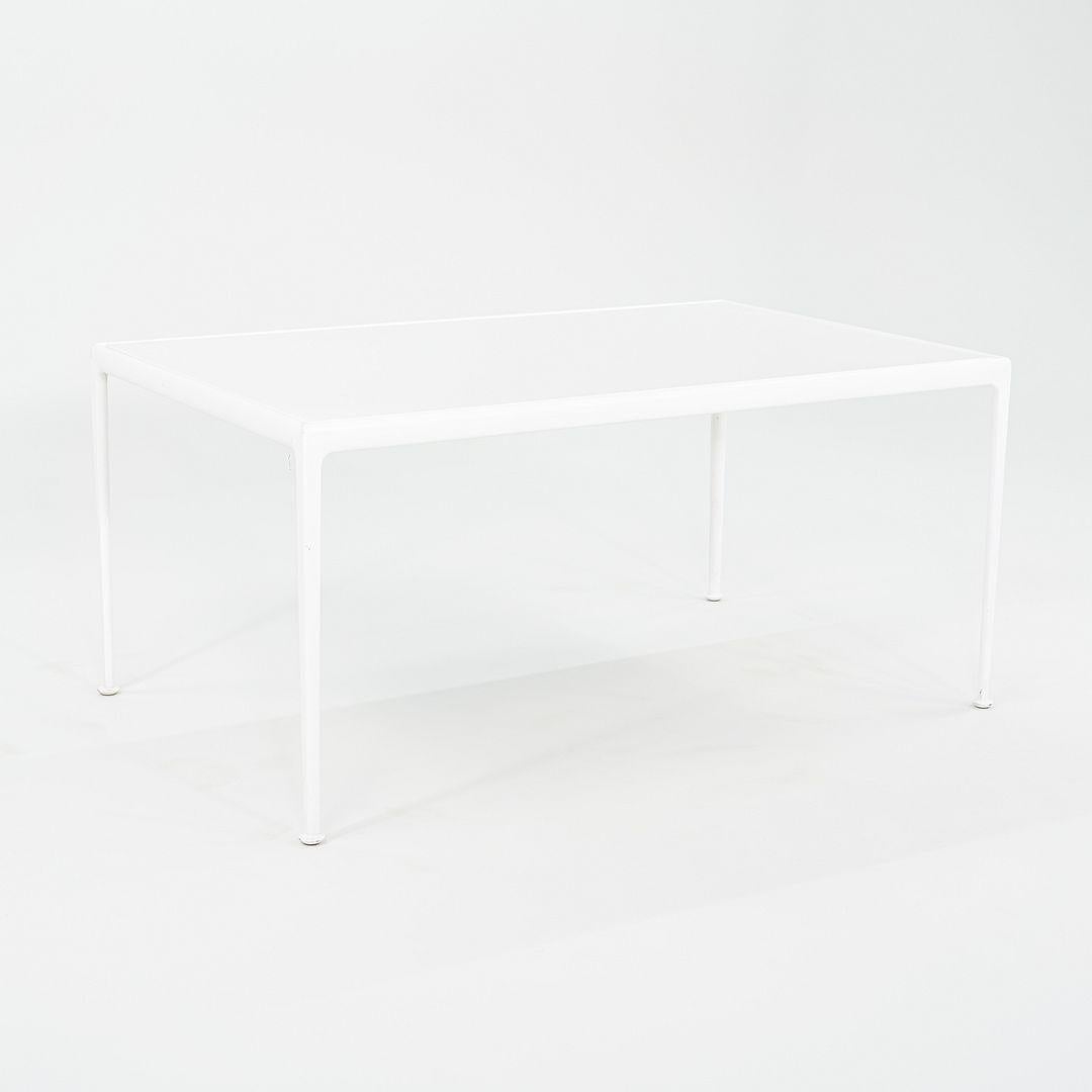 This is a 1966 Collection Outdoor Rectangular Dining Table, initially designed by Richard Schultz for Knoll in 1966. This particular table dates to the 2000s, and is in nice original condition. The table is constructed of cast extruded aluminum with