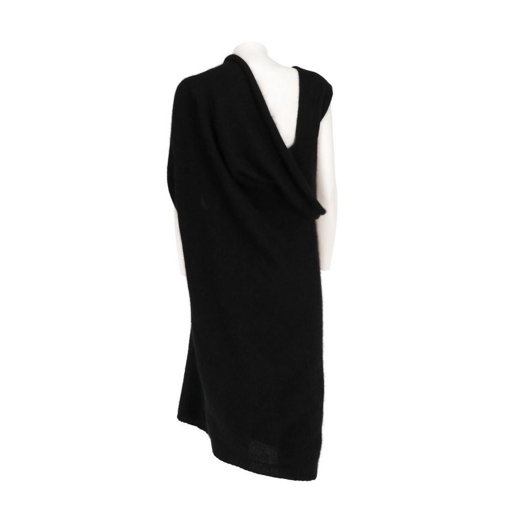 Rick Owens black wool and Angora knit dress. Asymmetrical model with drapery on the left shoulder. Knee length.

One size

Flat measurements
Height: 115 cm
Bust: 56 cm

Product code: X0710

Composition: Wool - Angora

Made in: Italy

Condition: Very