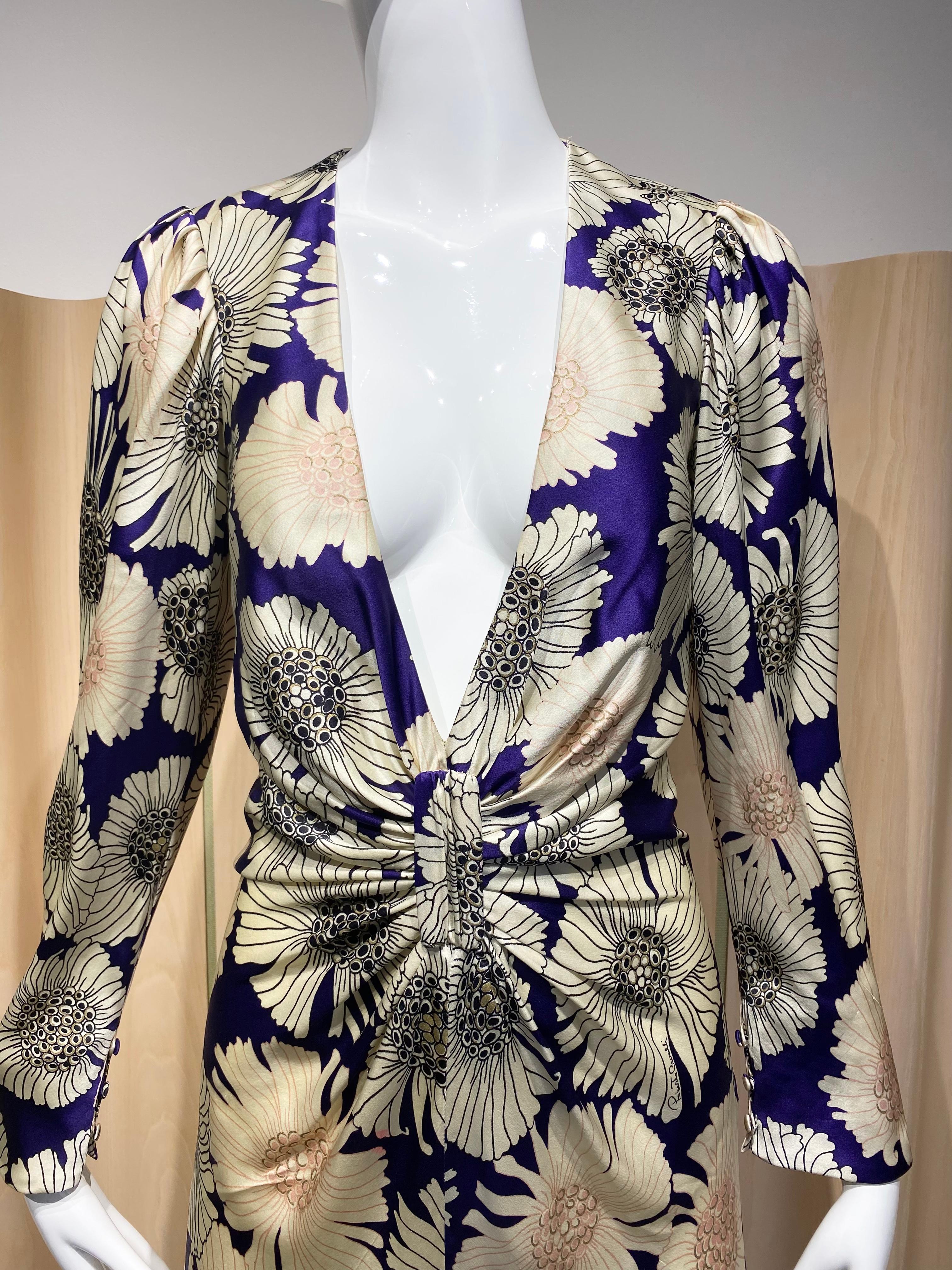 2000s Roberto Cavalli cream, purple ,pale pink and metallic gold  Silk Charmeuse  chrysanthemum flower print. V neck  long sleeve cocktail dress.  Perfect for engagement party or rehearsal dinner.
ruching waist
Deep V neck
Marked size 40 but fit
