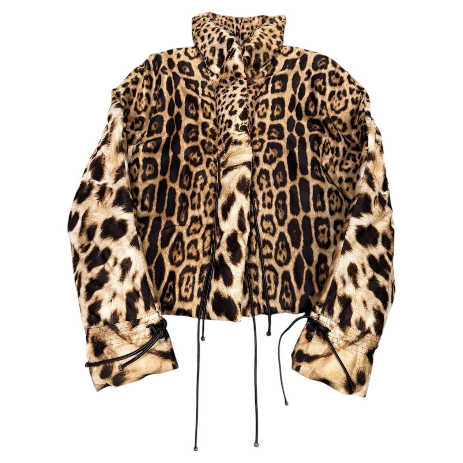 2000s Roberto Cavalli leopard print silk puffer jacket with leather straps