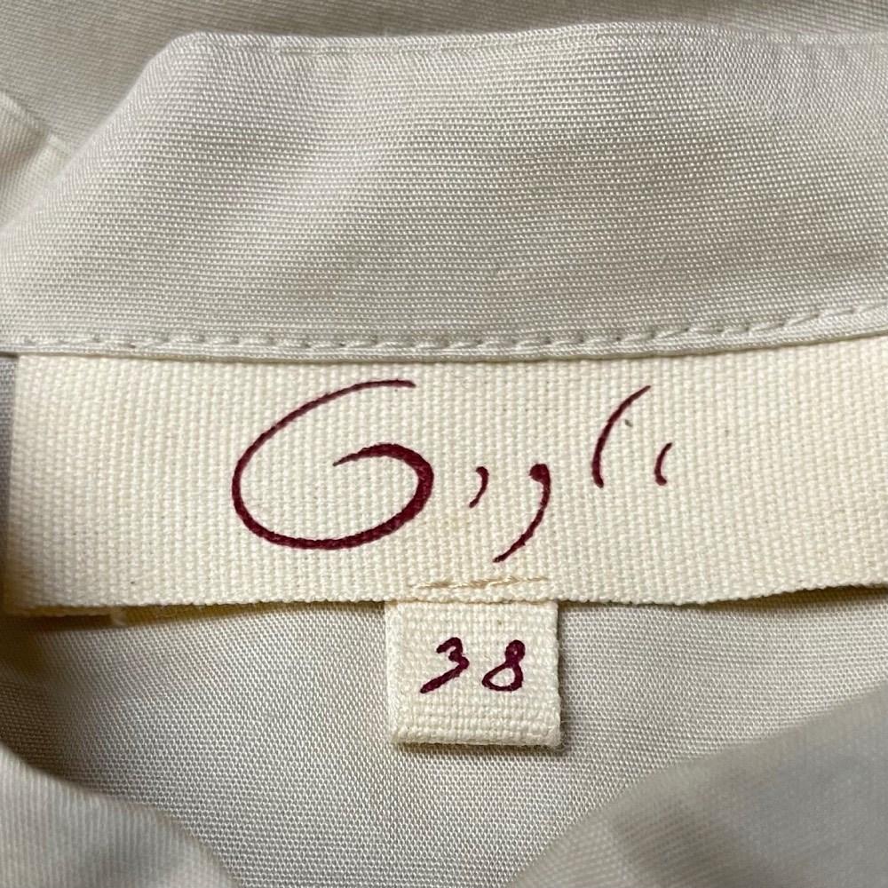 2000s Romeo Gigli beige cotton shirt with mandarin collar and built-in belt 1
